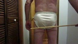 Cane in white panties